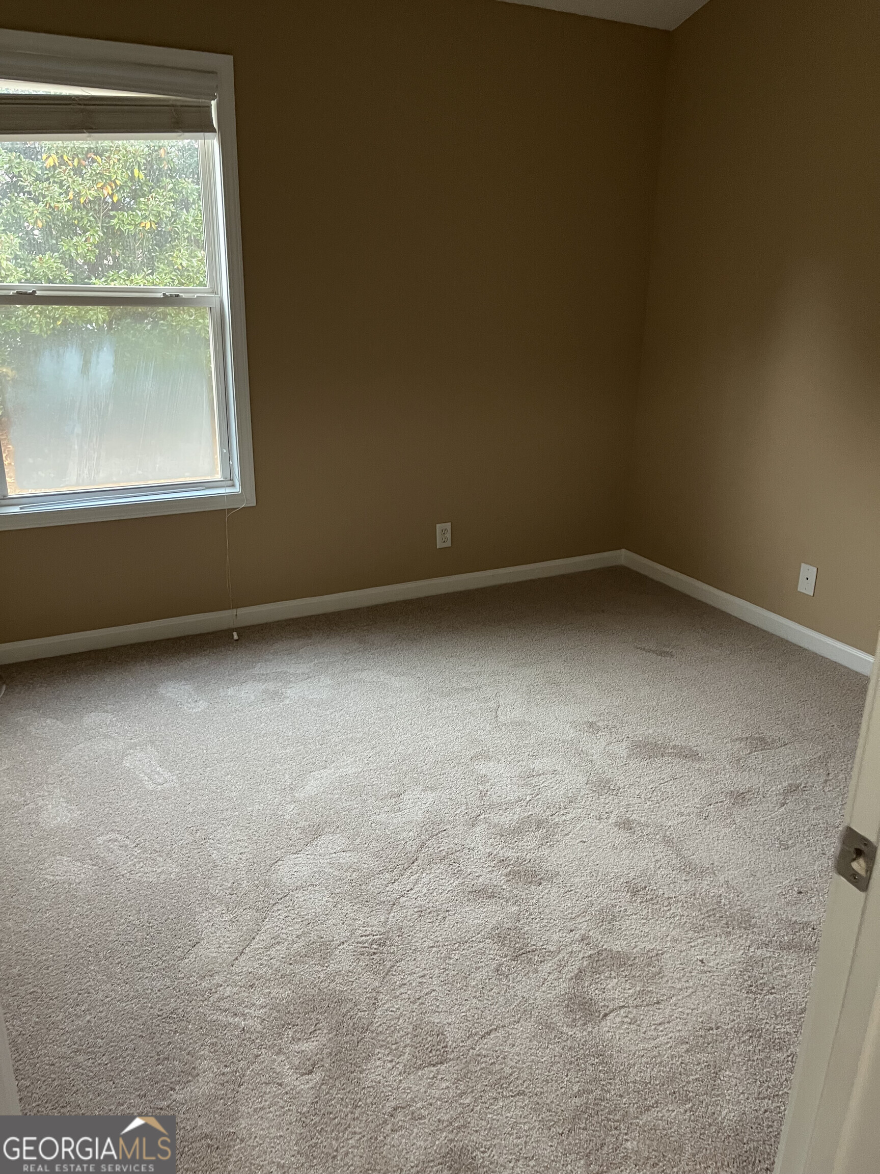 112 Granite Way Newnan, GA 30265 - Photo 9 of 22 a view of empty room with window