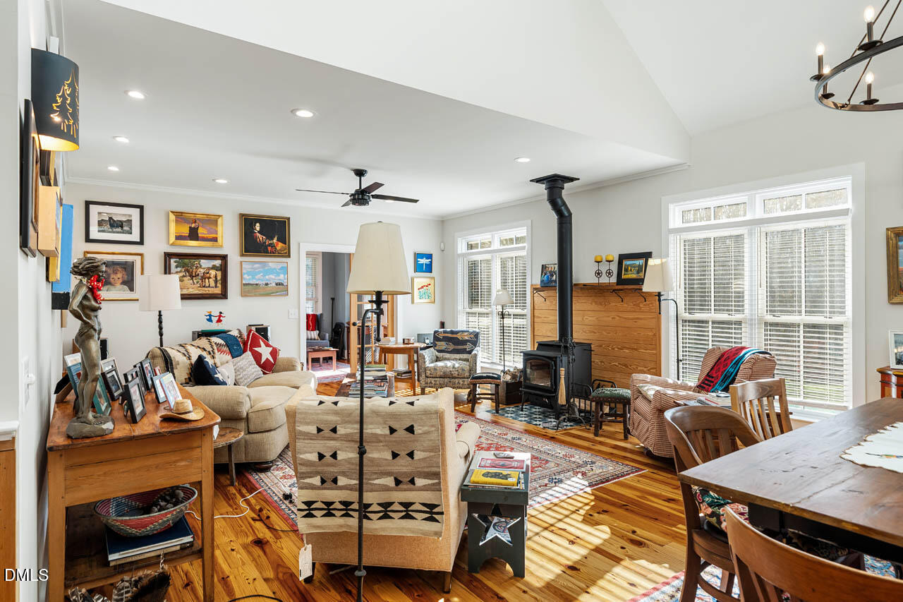 3833 Blakely Way Efland, NC 27243 - Photo 15 of 69 a living room with furniture and a flat screen tv