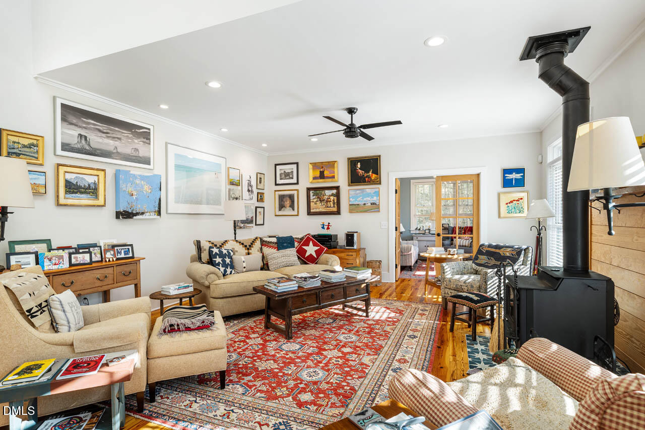 3833 Blakely Way Efland, NC 27243 - Photo 18 of 69 a living room with furniture kitchen view and a window