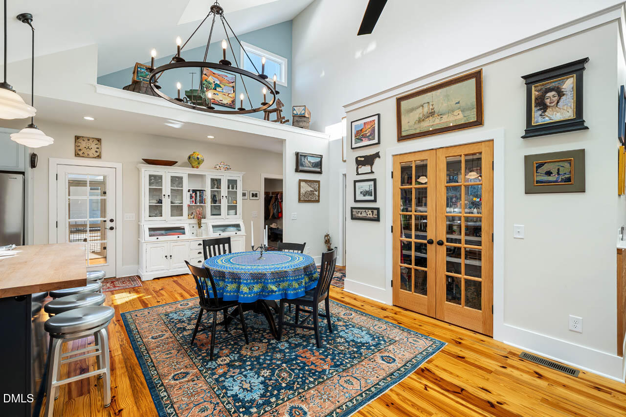 3833 Blakely Way Efland, NC 27243 - Photo 23 of 69 a view of a dining room with furniture