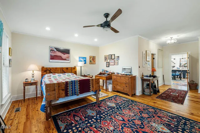 a view of walk in closet and storage
