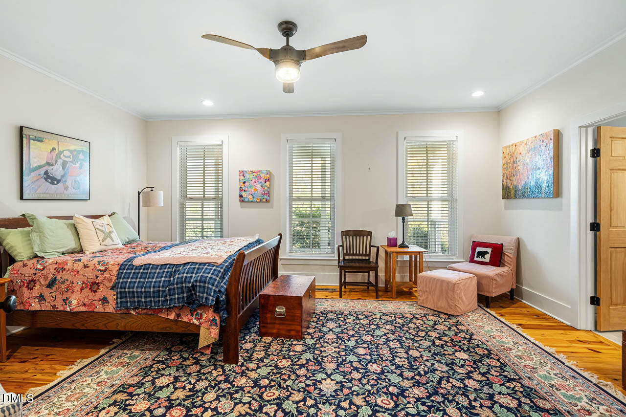 3833 Blakely Way Efland, NC 27243 - Photo 37 of 69 a bedroom with furniture and a window