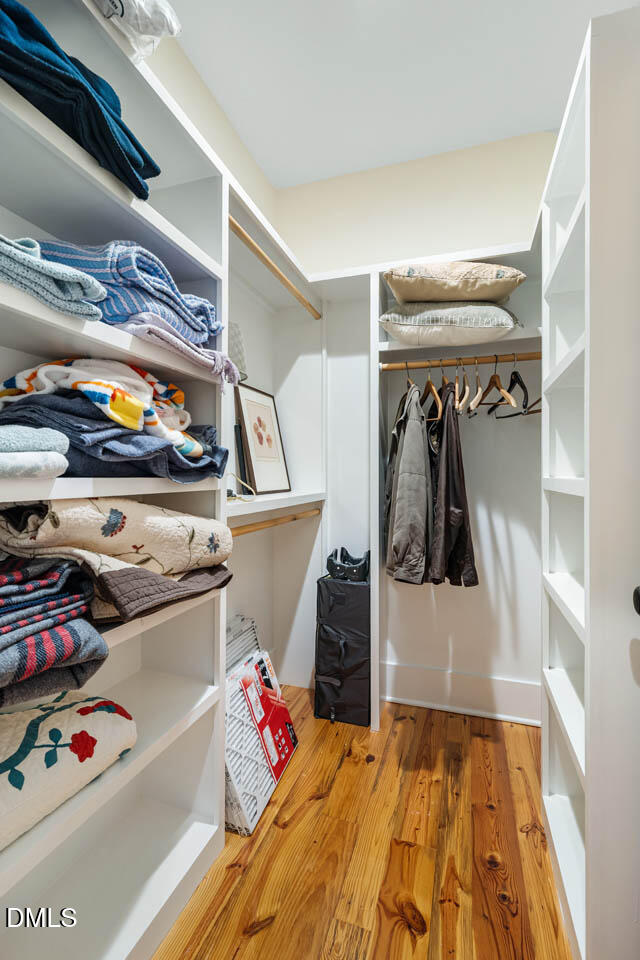 3833 Blakely Way Efland, NC 27243 - Photo 40 of 69 a view of walk in closet and storage
