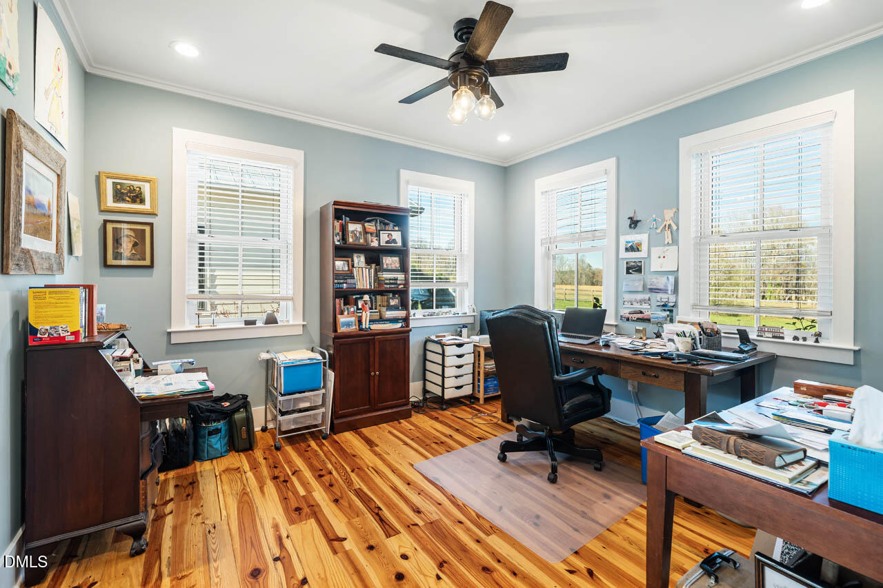 3833 Blakely Way Efland, NC 27243 - Photo 46 of 69 a view of a workspace with furniture and a window