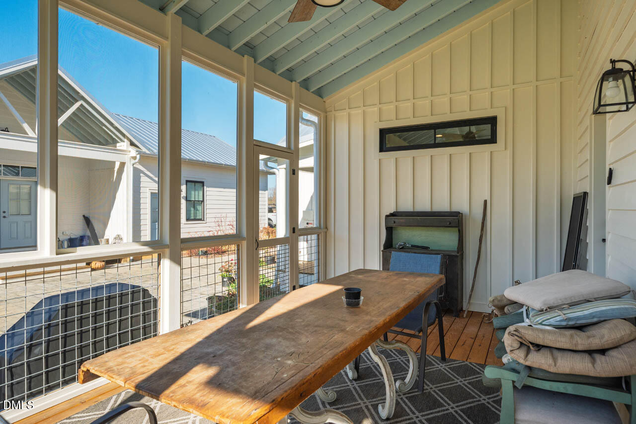 3833 Blakely Way Efland, NC 27243 - Photo 55 of 69 a view of a dining room with furniture window and outside view