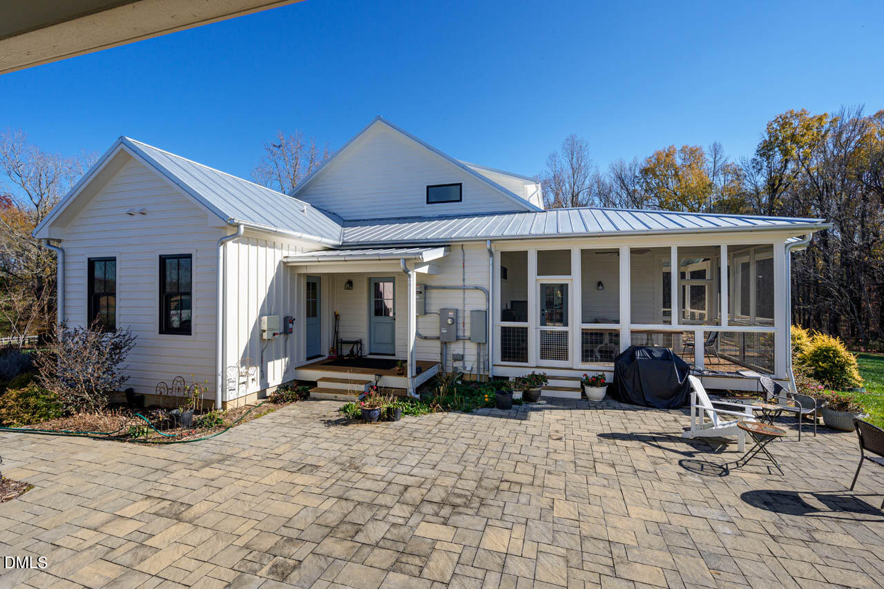 3833 Blakely Way Efland, NC 27243 - Photo 60 of 69 a front view of a house with sitting area