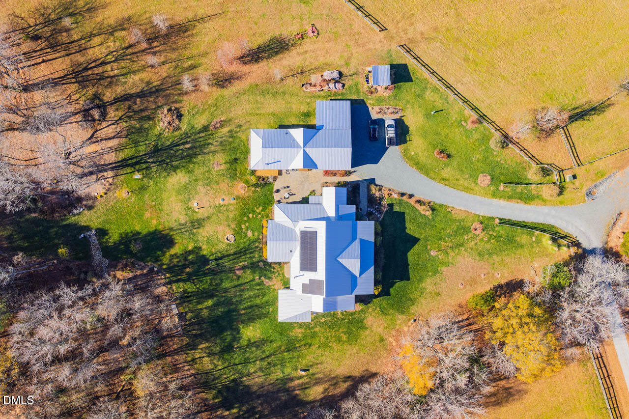 3833 Blakely Way Efland, NC 27243 - Photo 62 of 69 a view of a house with a yard