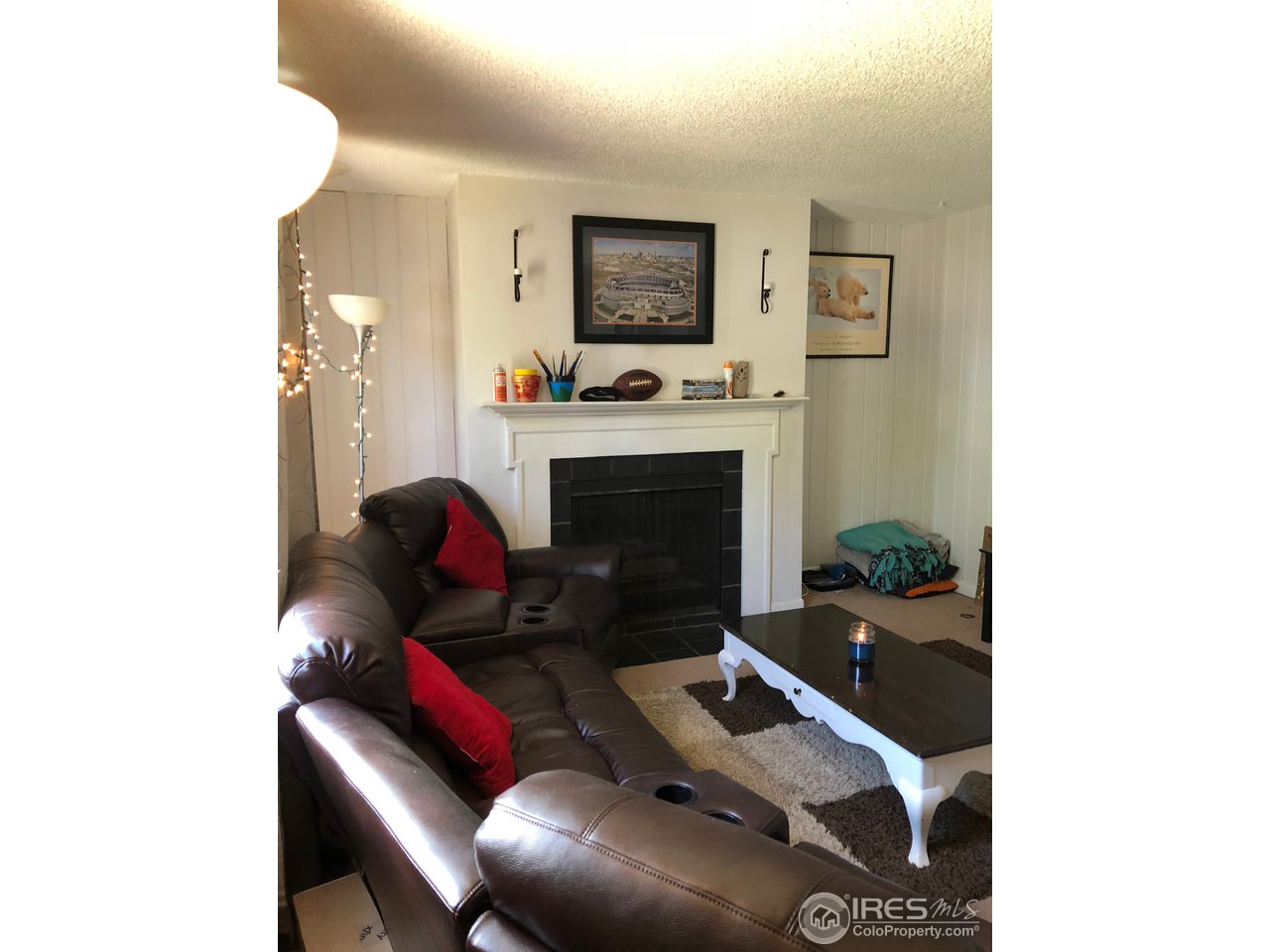 405 Briarwood Road Fort Collins, CO 80521 - Photo 3 of 17 Living Room with Gas Fireplace