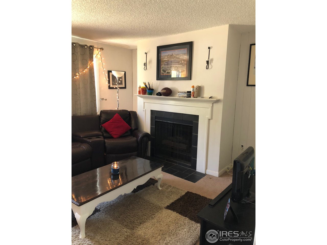 405 Briarwood Road Fort Collins, CO 80521 - Photo 4 of 17 Living Room with Gas Fireplace