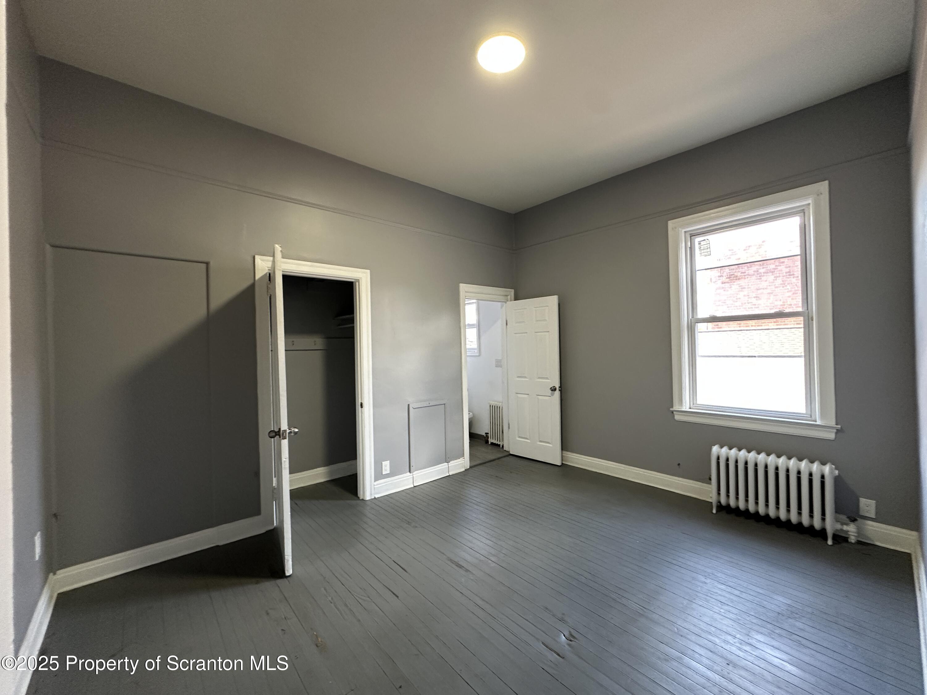 306 Wyoming Avenue, Unit F Wyoming, PA 18644 - Photo 3 of 5 IMG_5210