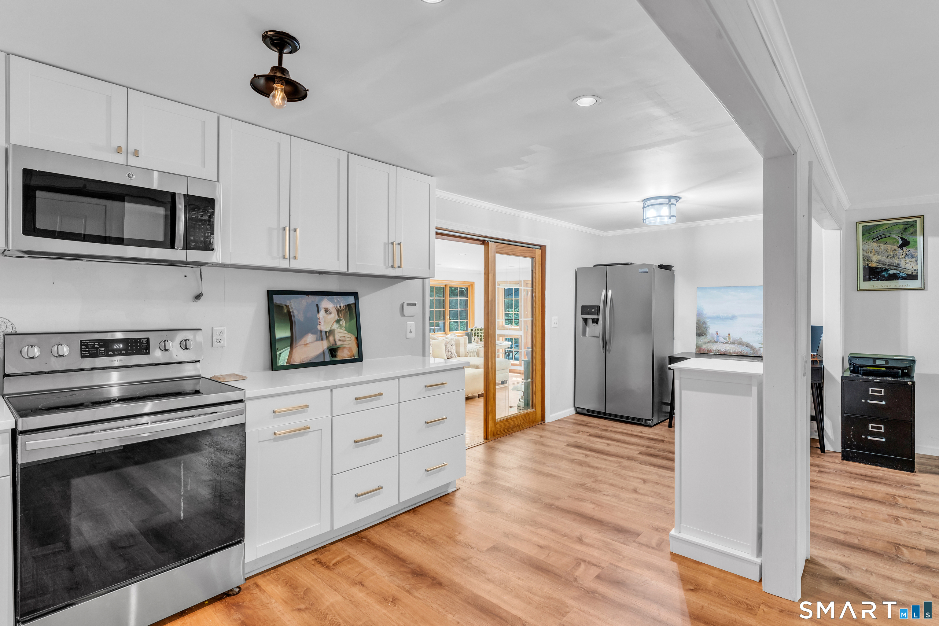 91 Whippoorwill Road Old Lyme, CT 06371 - Photo 8 of 25 Everything in kitchen is so open, it makes it a pleasure to work in here.