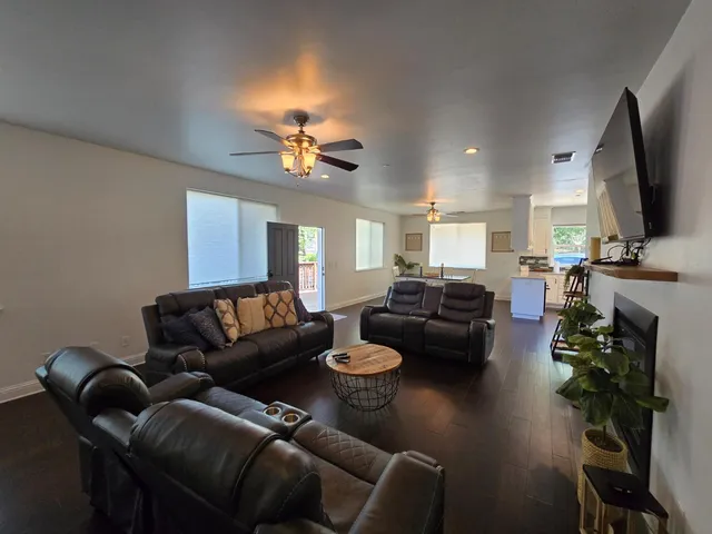 a kitchen with granite countertop a sink and cabinets