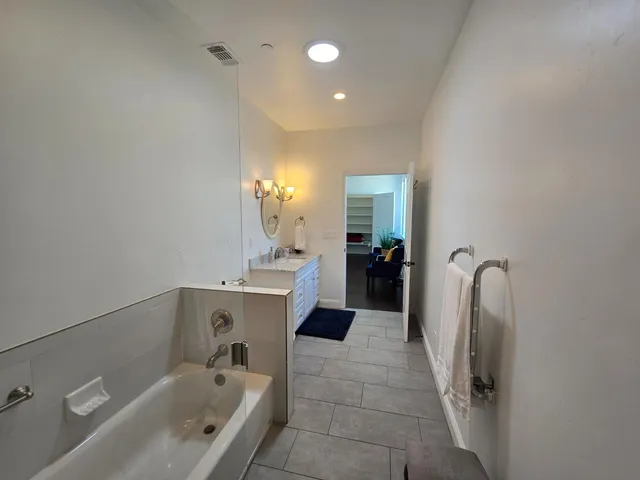 a view of a yard with trees in the background