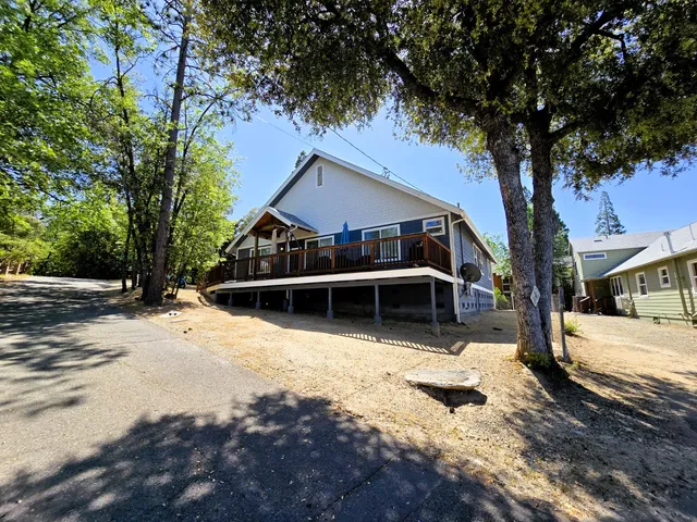 a view of a balcony with chairs