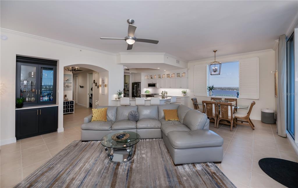 2104 West First Street, Unit 3103 Fort Myers, FL 33901 - Photo 14 of 74 a living room with furniture and a wooden floor