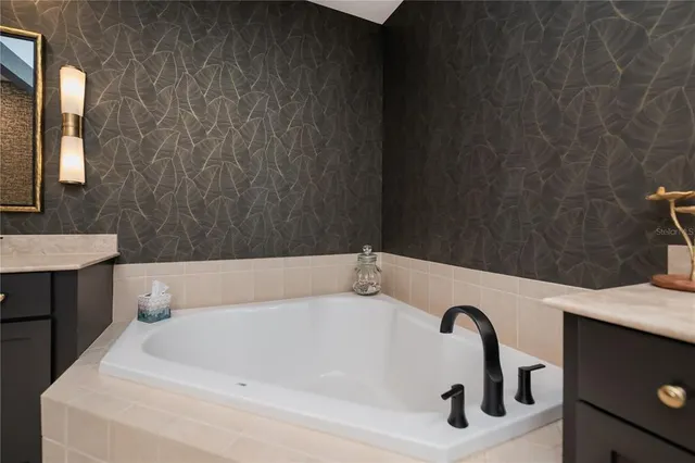 a view of two chairs in the balcony