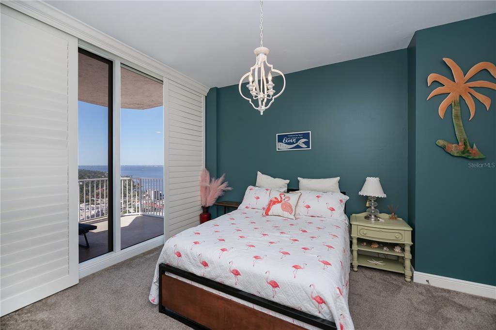 2104 West First Street, Unit 3103 Fort Myers, FL 33901 - Photo 39 of 74 a bedroom with a bed and a window