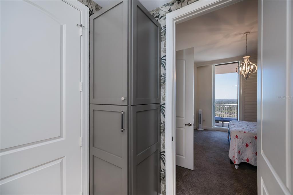 2104 West First Street, Unit 3103 Fort Myers, FL 33901 - Photo 45 of 74 a view of walk in closet with a mirror