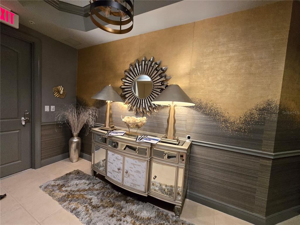 2104 West First Street, Unit 3103 Fort Myers, FL 33901 - Photo 6 of 74 a kitchen with a stove and a shower