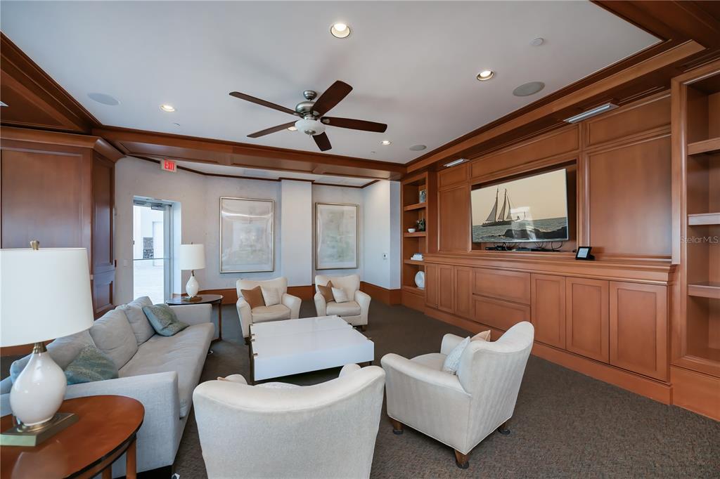 2104 West First Street, Unit 3103 Fort Myers, FL 33901 - Photo 73 of 74 a living room with furniture and a flat screen tv