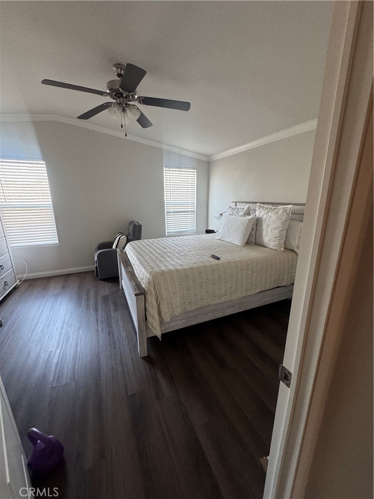 10550 Dunlap Crossing Road Whittier, CA 90606 - Photo 11 of 12 a bedroom with a bed and wooden floor
