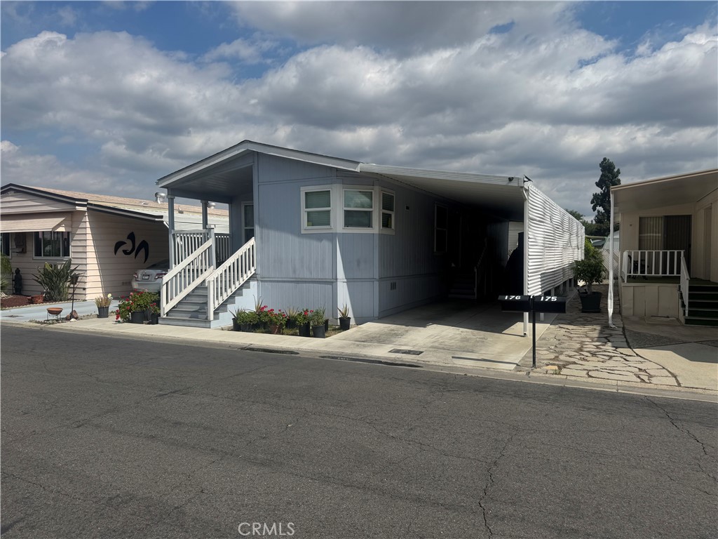10550 Dunlap Crossing Road Whittier, CA 90606 - Photo 4 of 12 a front view of a house with garage