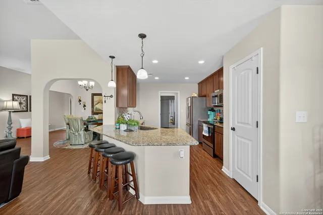 a view of a kitchen and dining room