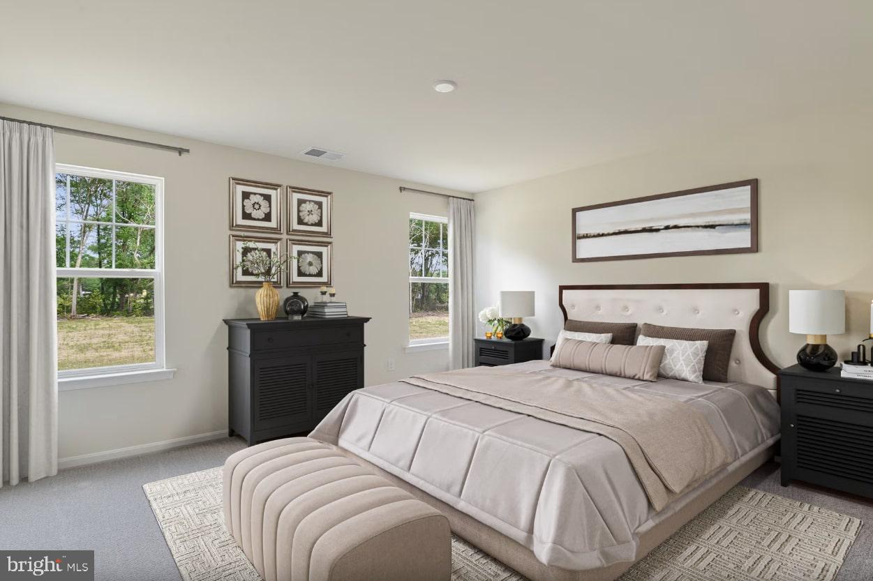 4 River Road Seaford, DE 19973 - Photo 6 of 6 a bedroom with a bed and a window