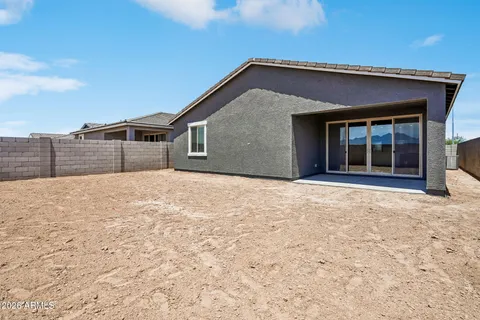 a house with trees in the background