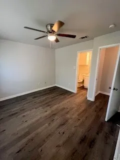 a view of a street with a garden