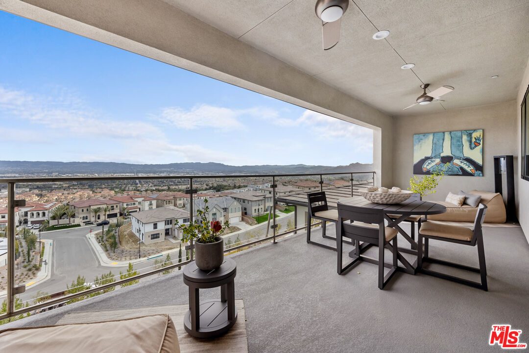 20378 Marlow Lane Porter Ranch, CA 91326 - Photo 37 of 52 a view of a patio with a table and chairs
