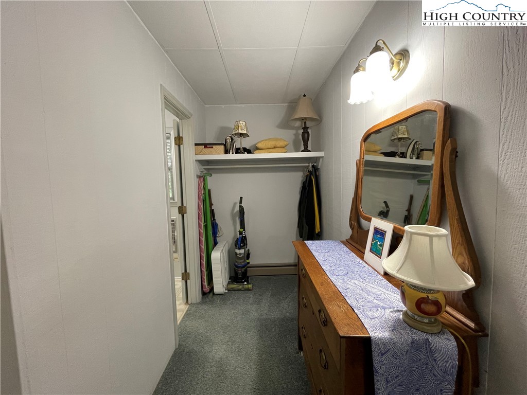911 Pine Ridge Road Beech Mountain, NC 28604 - Photo 9 of 22 a utility room with dryer and washer
