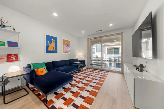 a living room with furniture and a couch