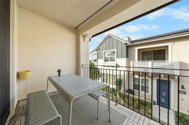 a view of a house with pool and wooden floor