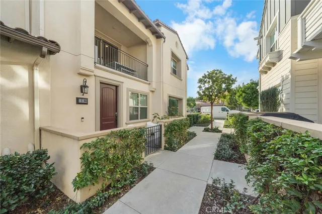 a view of a pathway along the building