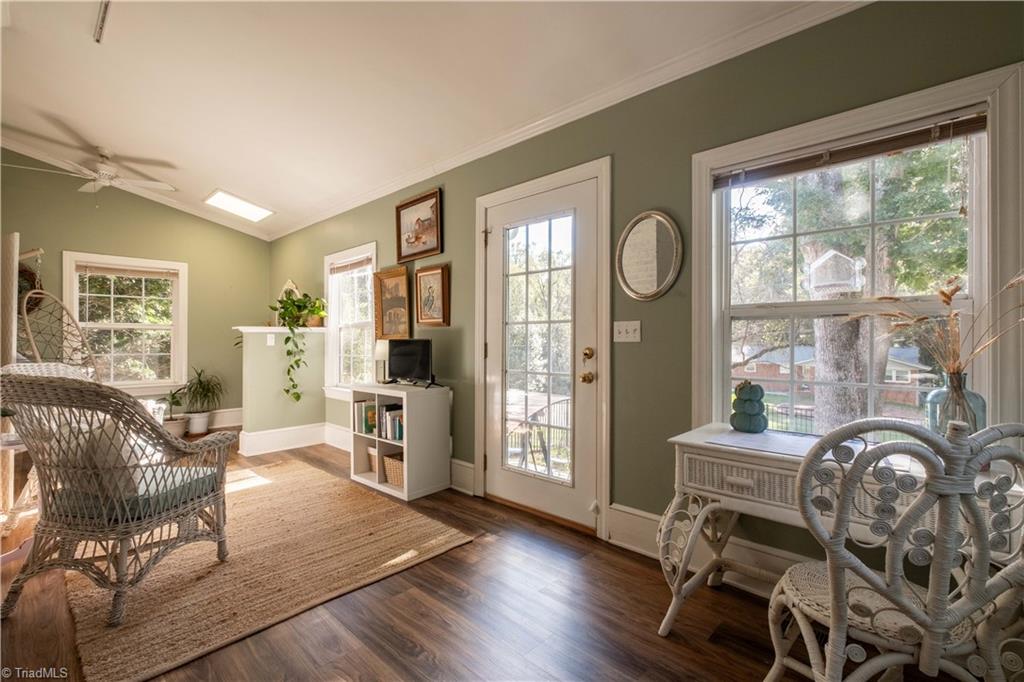 211 Dutchman Creek Road Elkin, NC 28621 - Photo 11 of 42 Just off the living room is a sun porch. Photos taken Oct. 2025