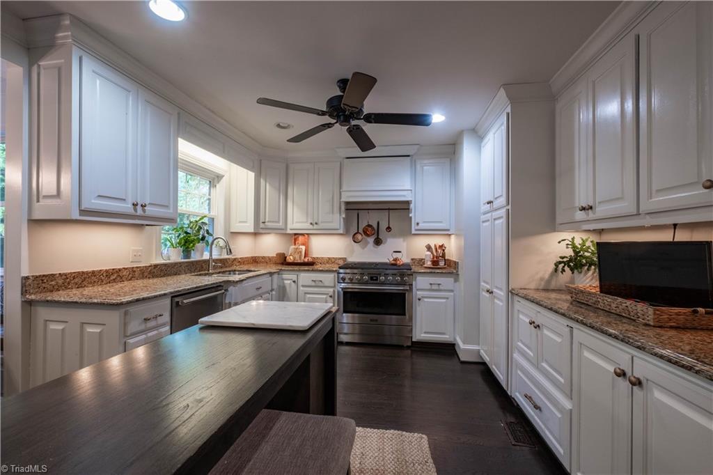 211 Dutchman Creek Road Elkin, NC 28621 - Photo 15 of 42 Spacious galley-style kitchen. Photos taken Oct. 2025