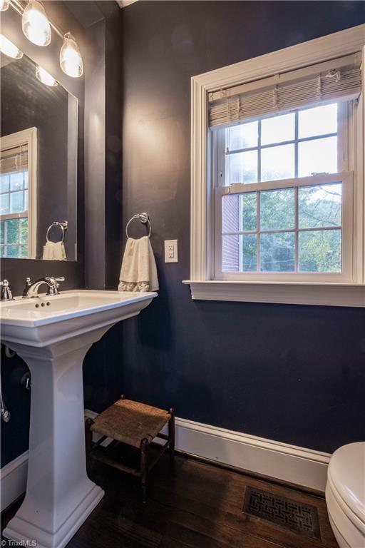 211 Dutchman Creek Road Elkin, NC 28621 - Photo 20 of 42 Powder room located on main level and just off the kitchen. Photos taken Oct. 2025