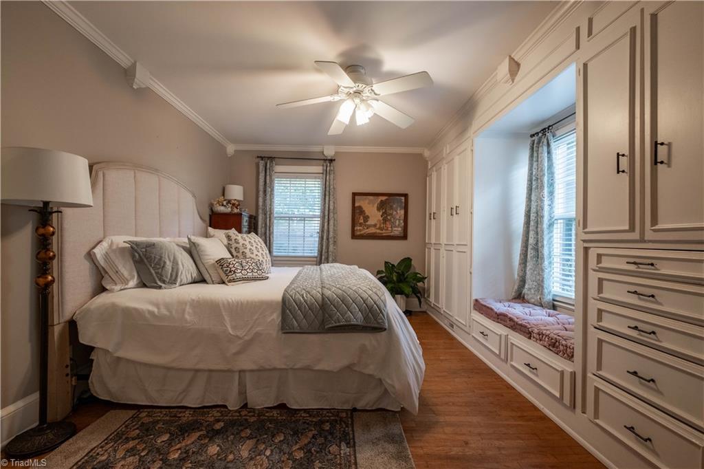 211 Dutchman Creek Road Elkin, NC 28621 - Photo 21 of 42 One of four bedrooms. This one is ideal for guests and primary bedroom and is located on the main level with en-suite bath. Photos taken Oct. 2025