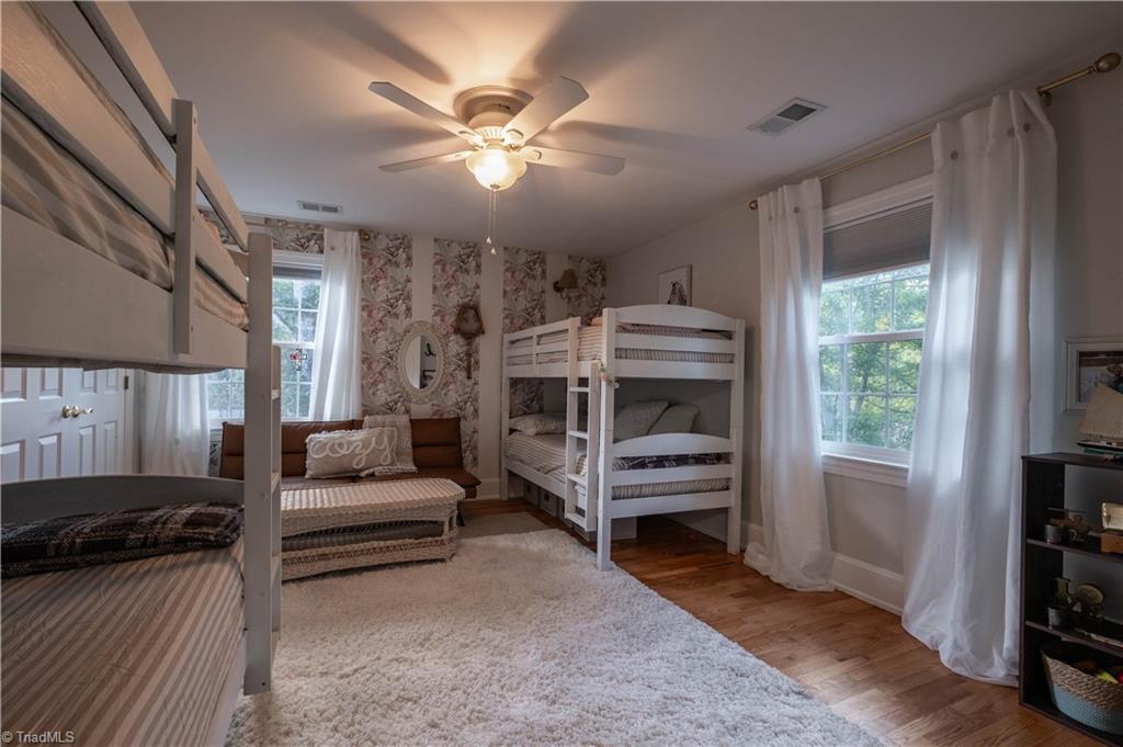 211 Dutchman Creek Road Elkin, NC 28621 - Photo 28 of 42 Three of four bedrooms located on second level. Photos taken Oct. 2025