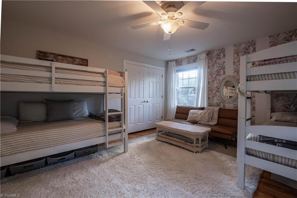 211 Dutchman Creek Road Elkin, NC 28621 - Photo 30 of 42 Three of four bedrooms located on second level Photos taken Oct. 2025