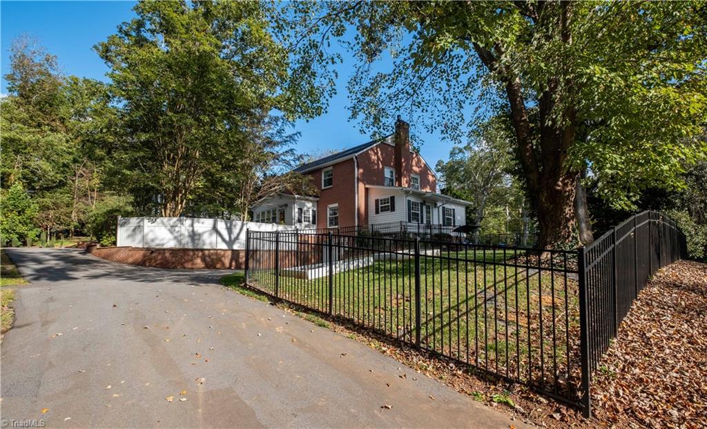 211 Dutchman Creek Road Elkin, NC 28621 - Photo 3 of 42 This home features a lovely circle driveway. Photos taken Oct. 2025