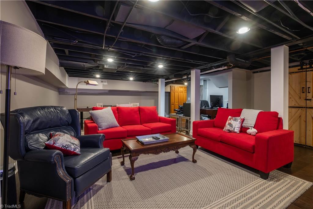 211 Dutchman Creek Road Elkin, NC 28621 - Photo 35 of 42 Finished basement. Photos taken Oct. 2025.