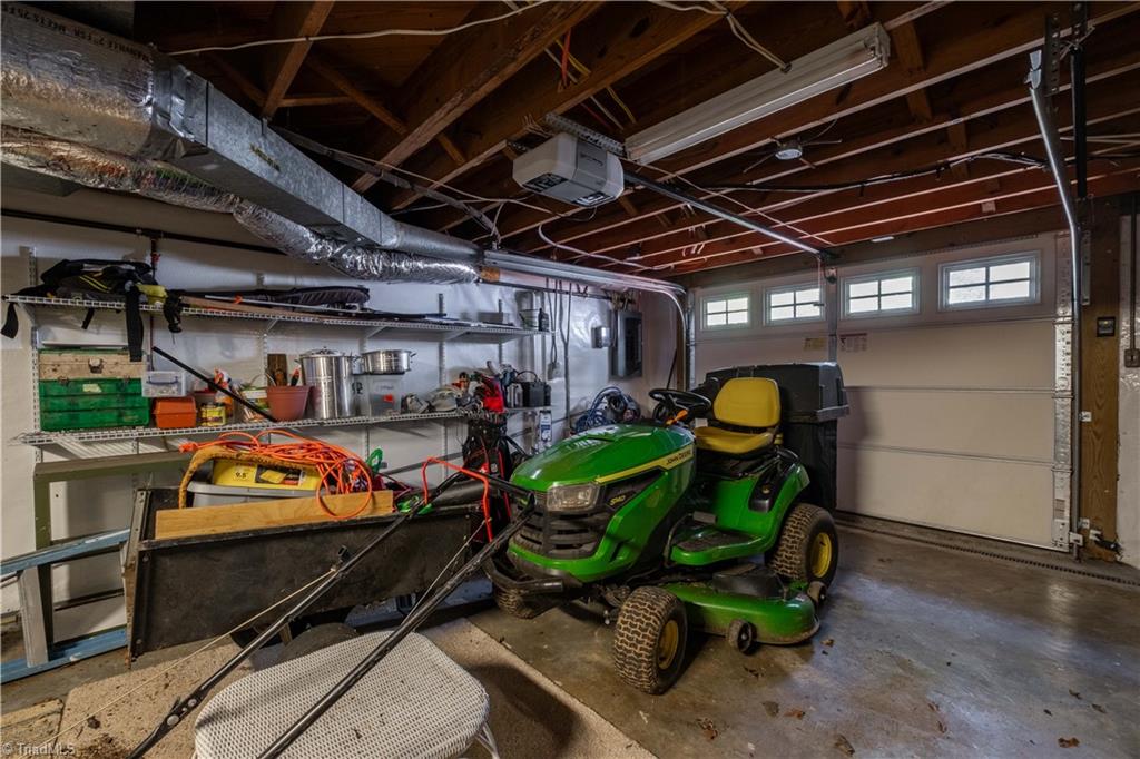 211 Dutchman Creek Road Elkin, NC 28621 - Photo 36 of 42 Unfinished basement area with garage. Photos taken Oct. 2025