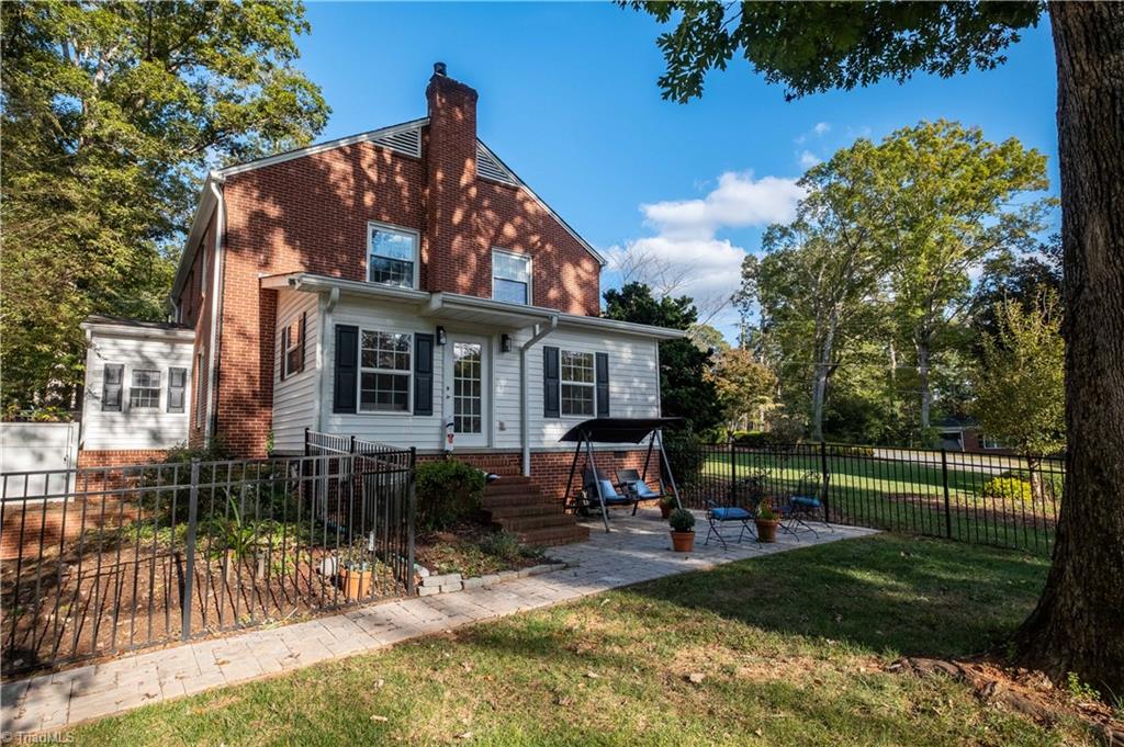 211 Dutchman Creek Road Elkin, NC 28621 - Photo 5 of 42 This home also features a fenced side yard. Photos taken Oct. 2025