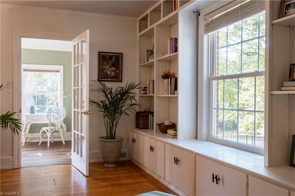 211 Dutchman Creek Road Elkin, NC 28621 - Photo 10 of 42 The living room features ample bookshelves. Photos taken Oct. 2025