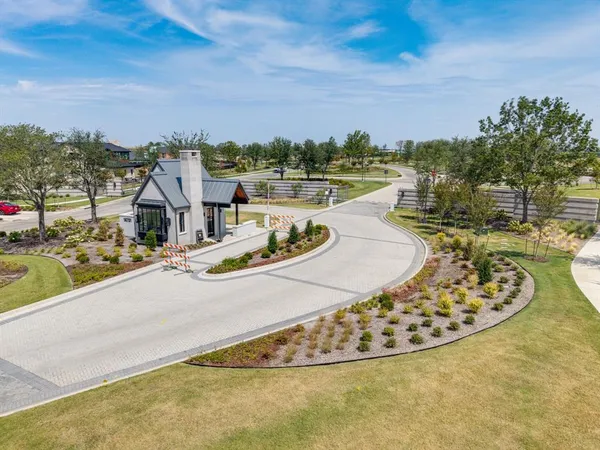 a view of a swimming pool with a lawn chairs