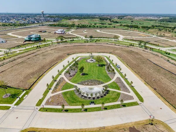 an aerial view of a swimming pool and outdoor space