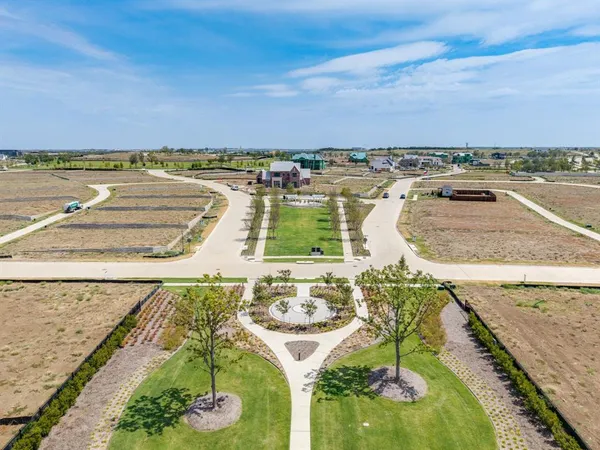 a view of a swimming pool with a lounge chair