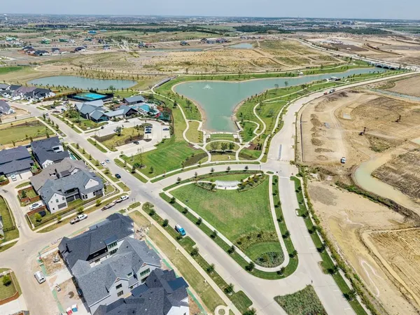 a view of a swimming pool with seating area